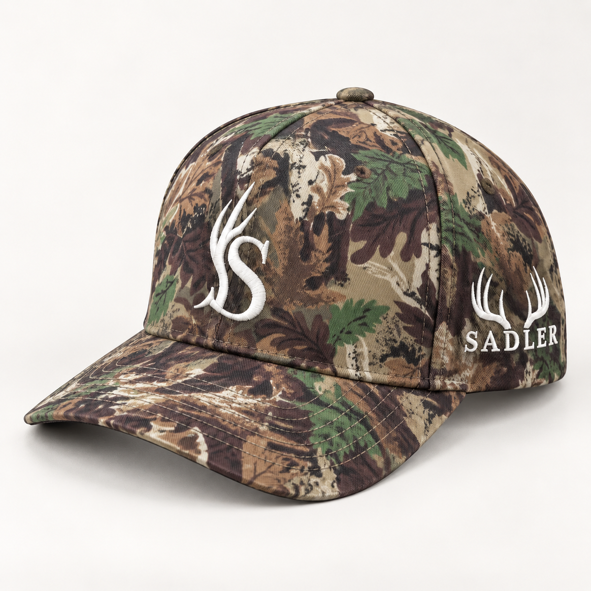 The Hadley camouflage SADLER hat with white embroidery